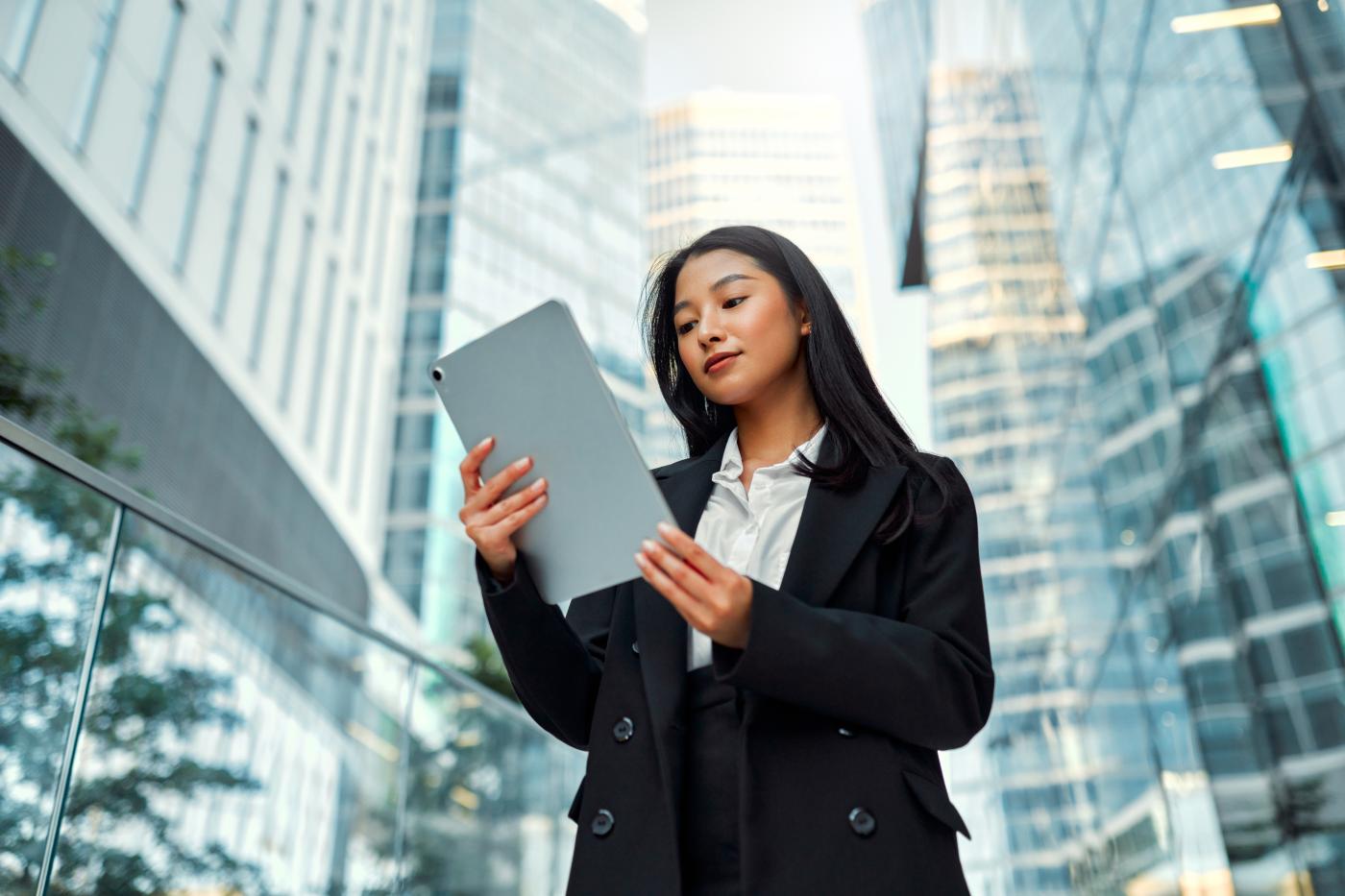 A business woman looking at documents.